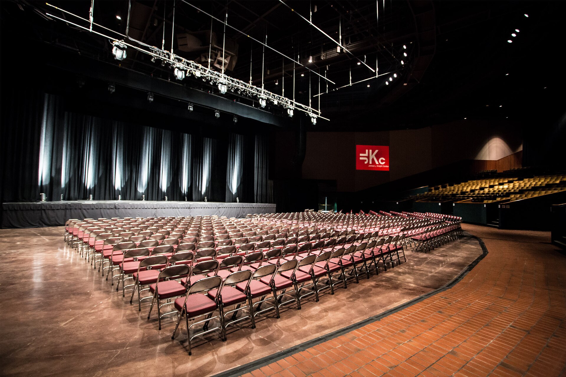 James L. Knight Center theater interior with rows of chairs facing the stage